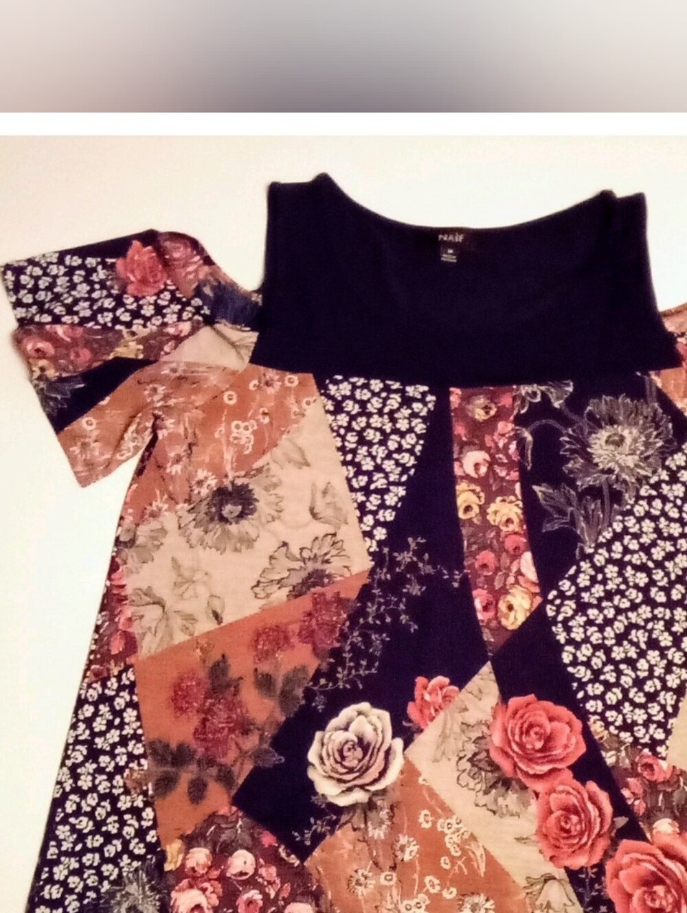 NAIF Patchwork Floral Cold-Shoulder Top in Black, Rust, Cream, Pink